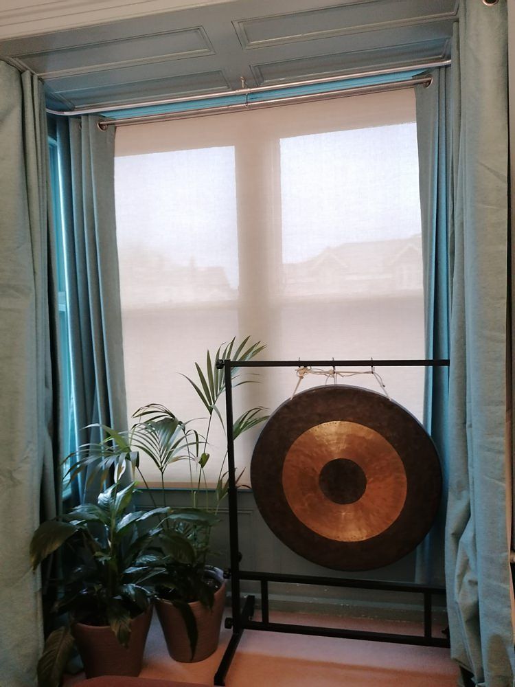 Bright Gong in the window open curtains Oxford Street WEB