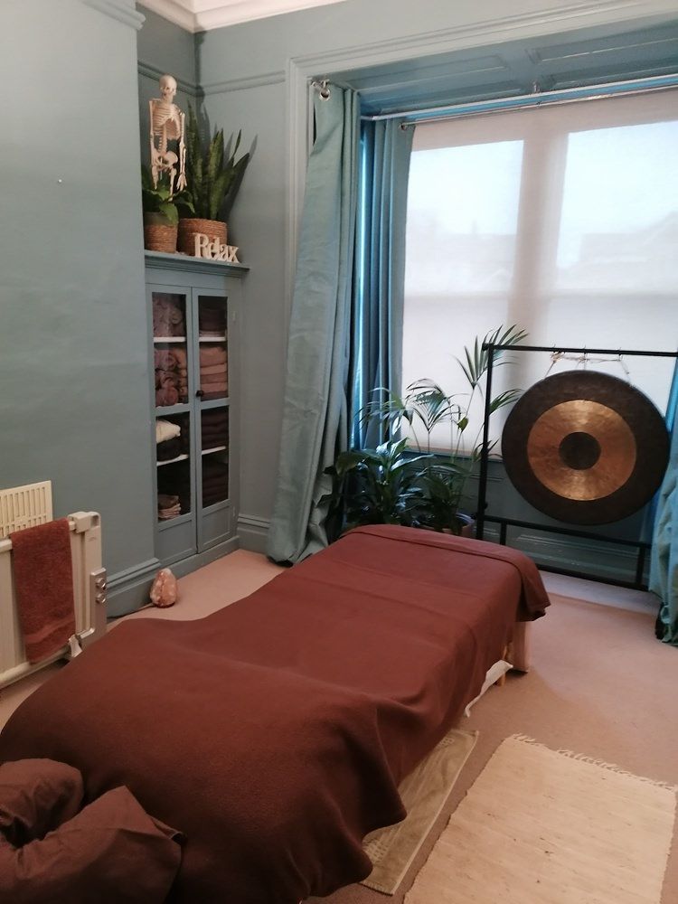 Head of massage table to window open curtains Oxford Street WEB