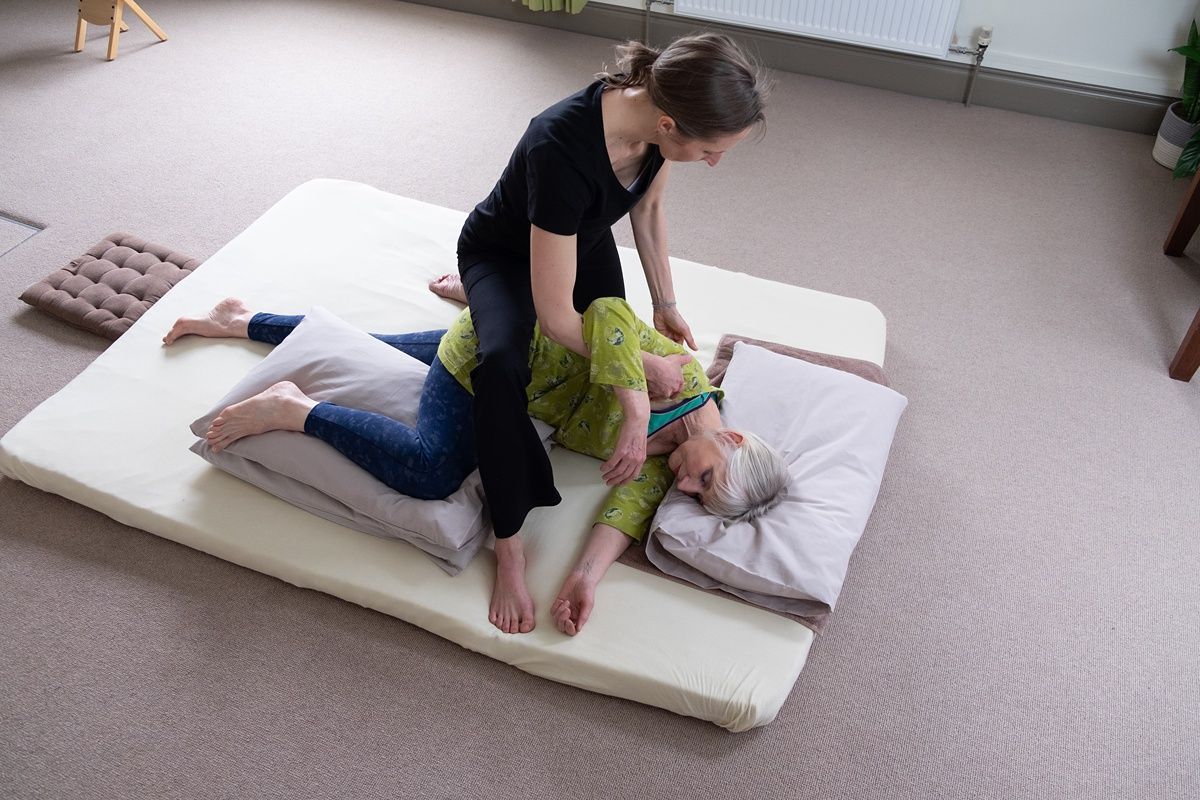 Joanne Bull delivering an arm and shoulder Thai Massage.